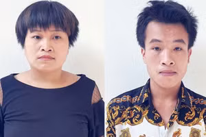 Lê Tiến Nguyện và Lê Thị Thu Trang tại cơ quan chức năng. Ảnh: Trung Dũng.