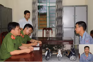 Trần Văn Tịnh (dấu x) làm việc với cơ quan chức năng.