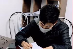 N.K.T. làm việc tại cơ quan chức năng.