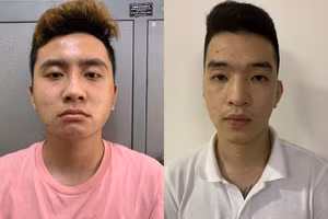 Nguyễn Đức Tài (trái) và Đào Duy Dũng tại cơ quan chức năng.