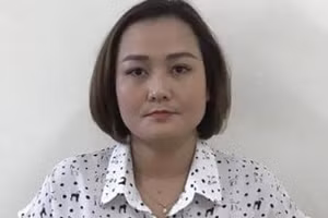 Nguyễn Thị Lan Anh tại cơ quan chức năng.