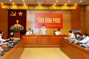 Phó Chủ tịch Thường trực UBND tỉnh Vĩnh Phúc Vũ Việt Văn thông tin tới cơ quan báo chí.