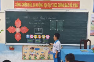 HS lớp 1 Trường TH Nhơn Nghĩa 1, huyện Phong Điền (TP Cần Thơ) trong giờ học Tiếng Việt.