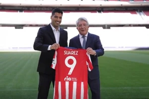 Luis Suárez sẽ mang áo số 9 khi chuyển tới Atlético de Madrid.