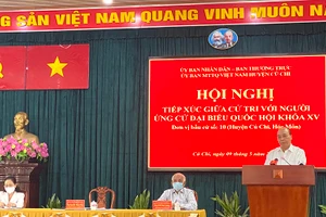 Chủ tịch nước Nguyễn Xuân Phúc trình bày Chương trình hành động tại Hội nghị tiếp xúc cử tri huyện Củ Chi sáng 9-5.