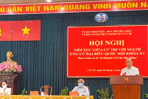 Chủ tịch nước Nguyễn Xuân Phúc trình bày Chương trình hành động tại Hội nghị tiếp xúc cử tri huyện Củ Chi sáng 9-5.