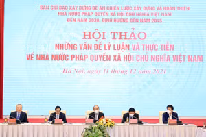 Các đồng chí lãnh đạo Đảng, Nhà nước chủ trì Hội thảo - Ảnh: VGP/Nhật Bắc.