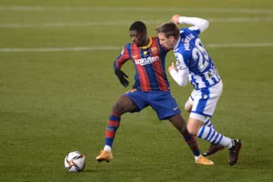 Các cầu thủ trẻ của Barca đã có trận đấu vô cùng vất vả khi Messi vắng mặt. (Ảnh: Getty).