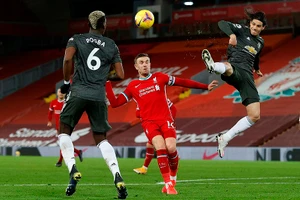 Liverpool và MU bất phân thắng bại trong trận "derby nước Anh". Ảnh: DM