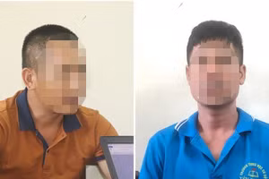 Vũ Văn Đức và Vũ Văn Tá tại cơ quan điều tra. (Ảnh: CA)