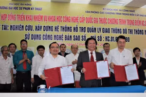 Trường ĐH Sư phạm Kỹ thuật, ĐH Đà Nẵng và đại diện Bộ Khoa học Công nghệ ký hợp đồng triển khai nhiệm vụ Khoa học công nghệ cấp quốc gia.