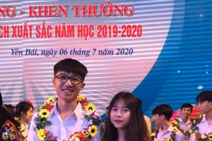 Lê Quốc Tiến trong một lần được vinh danh