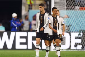 Cầu thủ Đức thất vọng sau trận thua Nhật Bản. Ảnh: IT.