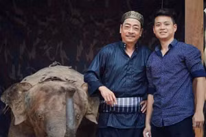 Hoàng Dương và bố - cố NSND Hoàng Dũng.