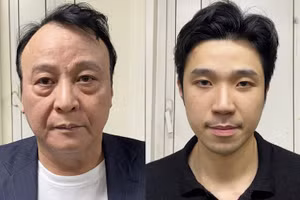 Bị can Đỗ Anh Dũng cùng con trai Đỗ Hoàng Việt.