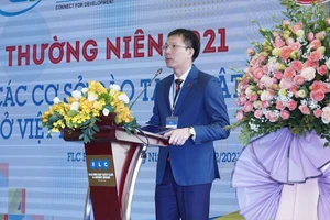 TS Đoàn Trung Kiên - Hiệu trưởng Trường ĐH Luật Hà Nội phát biểu tại hội nghị. 