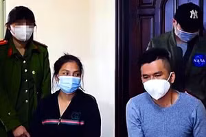 Nguyễn Thị Kim Anh và Hồ Minh Định bị bắt giữ. Ảnh: PĐ