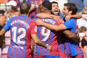Các cầu thủ Barca ăn mừng chiến thắng 2-1 trước Getafe ngày 29/8.
