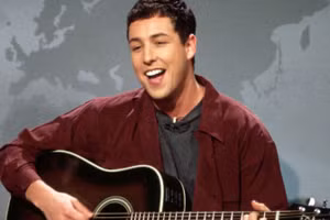 Adam Sandler trong phim “Saturday Night Live”, bộ phim làm nên tên tuổi của anh.