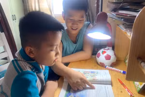 Học sinh Trường THCS Thái Văn Lung, TP Thủ Đức, TPHCM học tập tại nhà trong thời gian nghỉ phòng dịch Covid-19. Ảnh minh họa: P.Nga