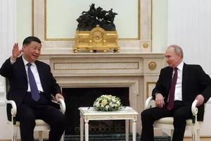 Tổng thống Nga Vladimir Putin tiếp đón Chủ tịch Trung Quốc Tập Cận Bình. 