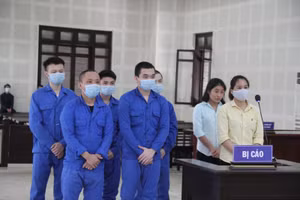 Các bị cáo tại phiên tòa ngày 4/3.