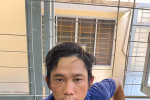 Huỳnh Ngọc Nghĩa tại cơ quan công an.