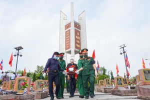 Lễ an táng 95 hài cốt liệt sĩ, quân tình nguyện, chuyên gia Việt Nam hi sinh tại nước bạn Lào