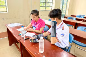 Thí sinh Tỷ trong phòng thi, ảnh chụp đầu giờ trước khi phát đề thi. Ảnh: CTV.