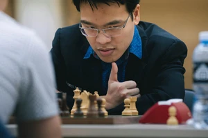 Lê Quang Liêm đánh bại Vladislav Artemiev - Ảnh: FIDE 