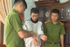 Quang bị cơ quan công an bắt giữ.