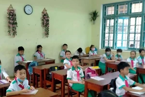 Các em học sinh Trường Tiểu học Nguyễn Viết Xuân. Ảnh: Bá Hùng. 