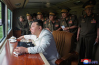 North-Korean-leader-Kim-Jong-Un-oversees-test-firing-240mm-MLRS-02.jpg