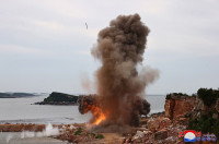 North-Korean-leader-Kim-Jong-Un-oversees-test-firing-240mm-MLRS-06.jpg