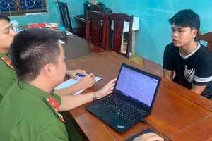 Phạm Văn Ngọc tại cơ quan công an. (Ảnh:CATH)