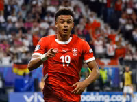 Chùm ảnh: Siêu dự bị giúp Đức thoát thua phút bù giờ 