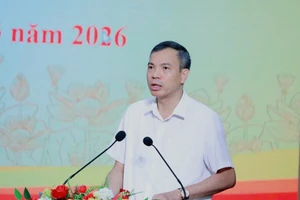 Ông Nguyễn Trung Thuận - Bí thư Đảng ủy, Chủ tịch HĐND xã An Khánh phát biểu tại hội nghị. 