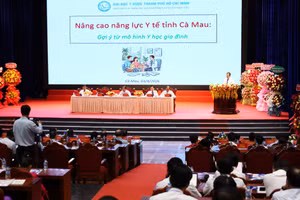 Đại biểu trình bày tham luận tại Hội thảo. Ảnh: QM.