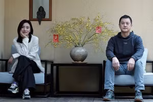 Lý Á Bằng và vợ trẻ Hải Hà Kim Hỷ.