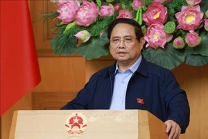 Thủ tướng Phạm Minh Chính chủ trì cuộc họp về phát triển sàn dữ liệu tại Việt Nam. Ảnh: Dương Giang/TTXVN