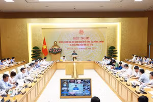 Thủ tướng Phạm Minh Chính chủ trì Hội nghị sơ kết công tác phòng, chống và khắc phục hậu quả bão số 3. (Ảnh: Dương Giang/TTXVN).