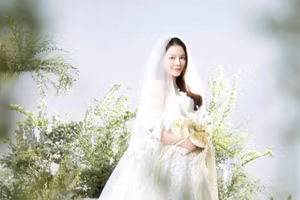 Lý Nhã Kỳ diện váy cưới trẻ trung bất ngờ ở tuổi U50