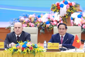 Thủ tướng Phạm Minh Chính và Thủ tướng Nga Mikhail Vladimirovich Mishustin đối thoại với doanh nghiệp cấp cao Việt Nam - Liên bang Nga. (Ảnh: Dương Giang/TTXVN)