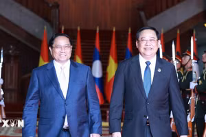 Thủ tướng Phạm Minh Chính hội kiến Thủ tướng Lào Sonexay Siphandone, Chủ tịch ASEAN 2024. (Ảnh: Dương Giang/TTXVN)