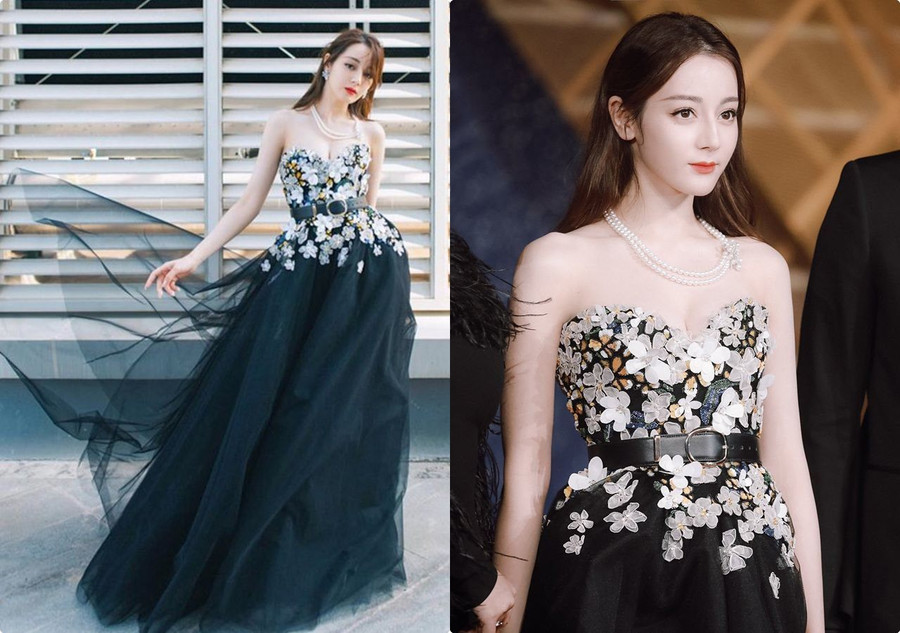 Tiếp nữa là rớt... bông tai. Mỹ nhân Tân Cương - Địch Lệ Nhiệt Ba ngày hôm đó hiện một chiếc đầm voan đen, phần thân trên cúp ngực. Cô kết hợp cùng với trang sức thuộc về một thương hiệu nổi tiếng có giá ước chừng 60.000 USD, riêng hoa tai có giá hơn 28.000 USD.