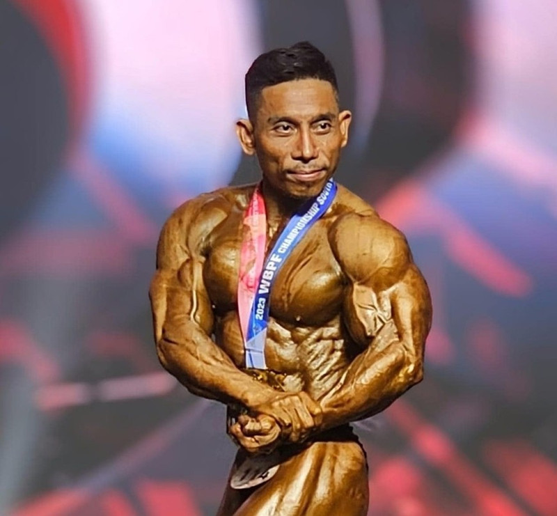 Phạm Văn Mách nổi tiếng nhờ phong độ ổn định kéo dài hàng chục năm và phong cách tập luyện nghiêm khắc, khoa học. pham-van-mach-the-hinh-the-gioi.jpg