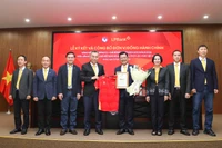 Lễ ký kết và công bố tài trợ giữa VFF và LPBank tại Vòng loại U23 châu Á 2026.