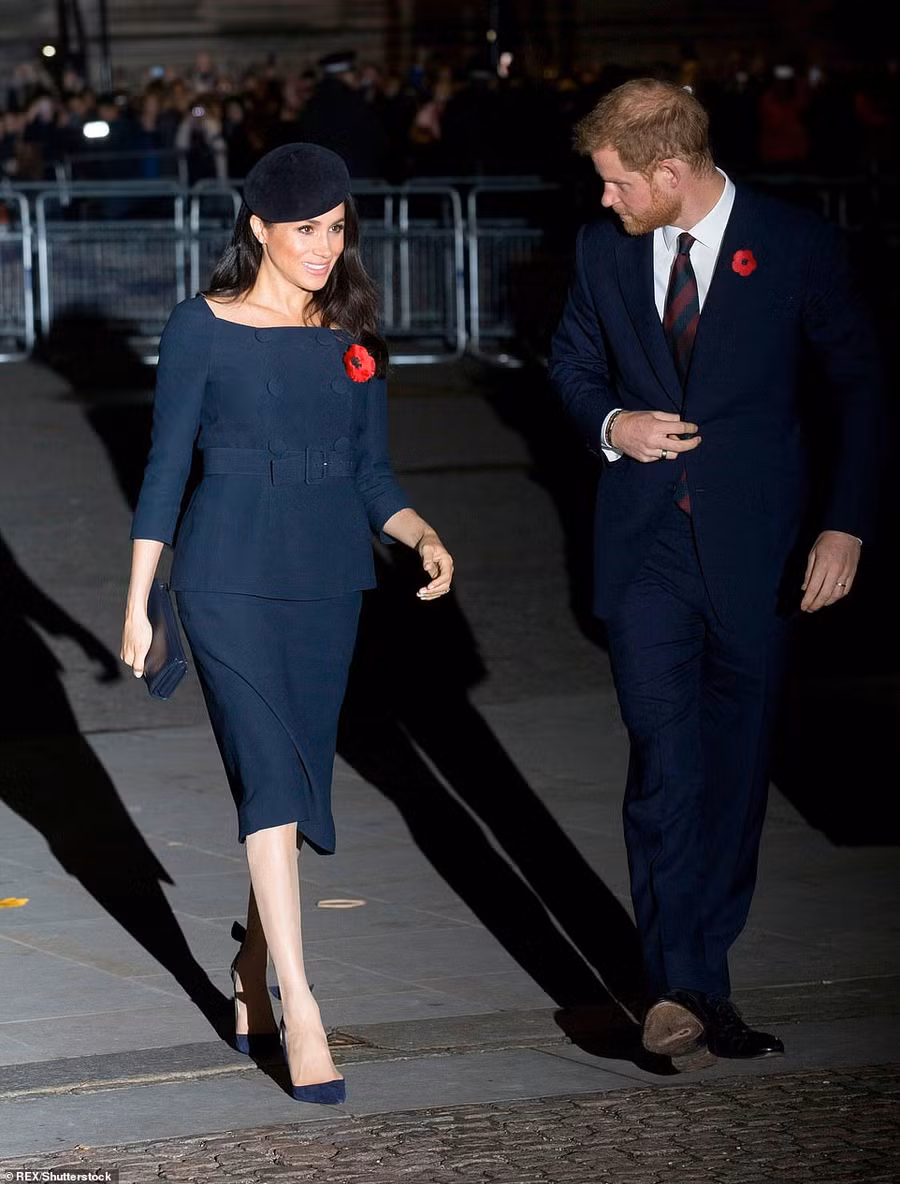 The Duchess joined Prince Harry for a service at Westminster Abbey in a navy peplum top with bateau neckline and a matching skirt, believed to be Prada, £1,500
