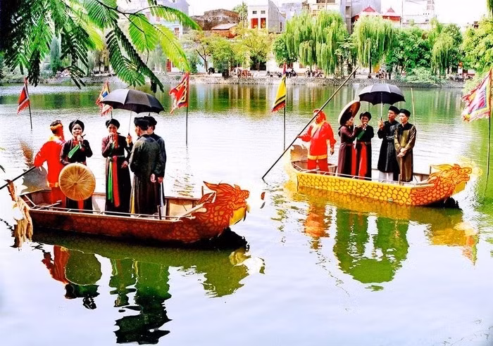Hát quan họ dịp lễ hội làng Thổ Hà. Ảnh: ITN.