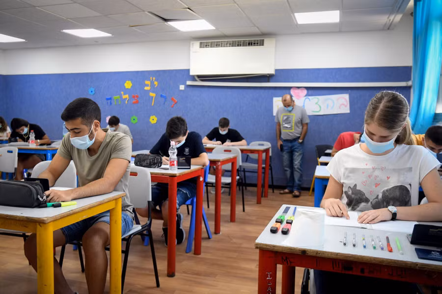 Giáo viên Israel áp lực vì khối lượng công việc nặng nề.